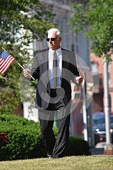 Portrait Of An Adult Senior Congressman Walking photo