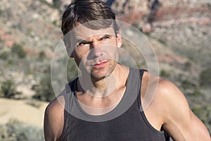 Portrait of adventurous outdoorsman in the desert photo