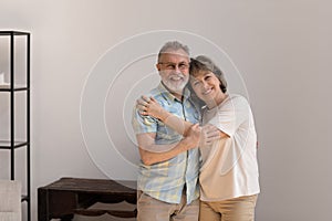 Portrait of affectionate loving older family couple.