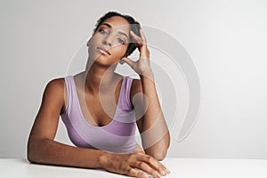 Portrait of african american confident woman looking at camera