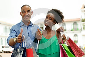 Portrait African American Couple Shopping Smiling With Thumb up