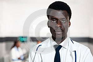 Portrait of african american doctor looking at camera