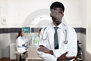 Portrait of african american doctor looking at camera