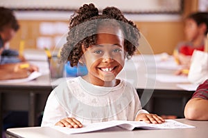 Portrait of African American elementary school girl in class