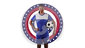 Portrait of african american female soccer player holding a ball against stars on spinning circles