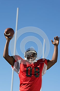 Portrait of african american Football Player Celebrating Touchdown