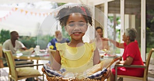 Portrait of an African American girl spending time in garden,