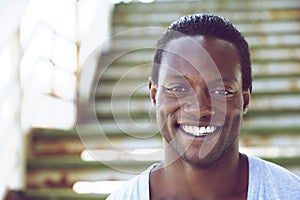Portrait of an african american man smiling outdoors