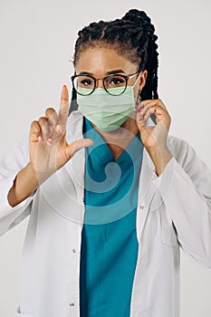 Portrait of african american nurse or doctor woman wearing medical face mask