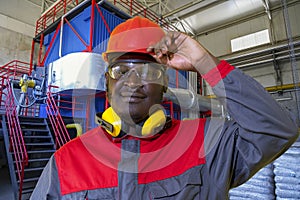 Portrait Of African American Worker In Protective Workwear In Central Boiler Plant