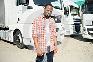 portrait African male happy Smiling confident positive near lorry. Young Man plaid shirt owner Truck Driver In Business