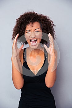 Portrait of african woman shouting