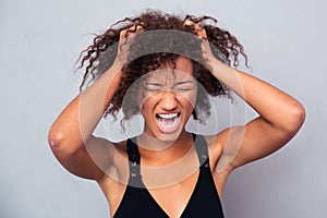 Portrait of afro american woman shouting