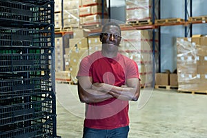 Portrait of afro man worker in warehouse