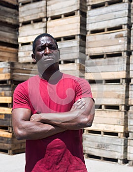 Portrait of afro man worker in warehouse