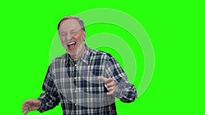 Portrait of aged senior caucasian man laughing hard.