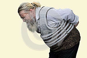Portrait of aged senior man suffering from backache.