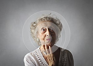 Portrait of an aged woman with jewels