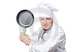 Portrait of aggressive evil chefs with frying pan