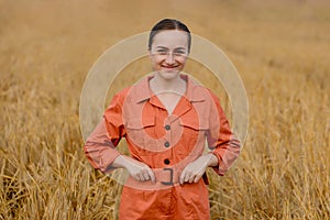 Portrait Agronomist farmer with digital tablet computer in wheat field