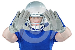 Portrait American football player defending photo