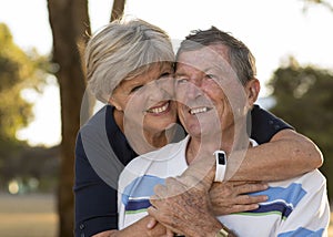 Portrait of American senior beautiful and happy mature couple ar
