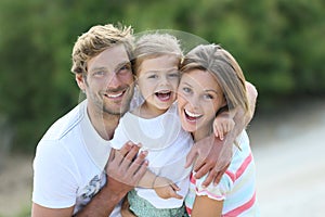 Portrait of amiling happy family on holidays