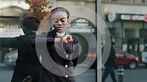 Portrait angry african american business woman girlfriend sad upset girl standing city street worry about being late