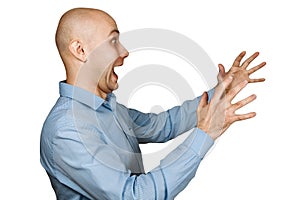 Portrait angry dangerous bald man trying to watch and scare on white isolated background