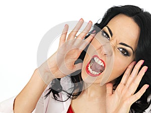 Portrait of an Angry Furious Frustrated Young Woman Shouting In A Rage