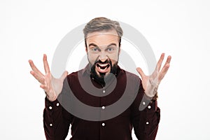 Portrait of an angry furious man shouting