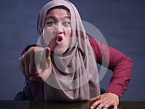Angry Muslim Woman Starring at camera photo