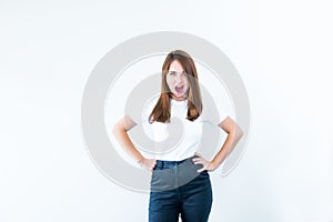 Portrait of angry pensive crazy stress beautiful young caucasian woman looking at camera and screaming out isolated on white backg