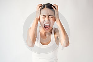Portrait of angry pensive mad crazy asian woman screaming out expression, facial
