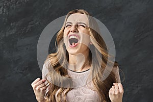 Portrait of angry woman shouting photo