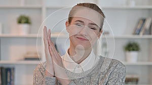 Portrait of Appreciative Woman Clapping