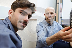 portrait apprentice and engineer in factory