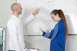 Portrait apprentice taking notes