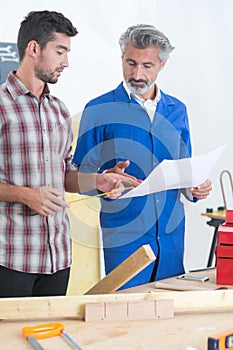 Portrait apprentice at wood workshop