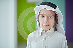 Portrait of Arabian boy in traditional clothes