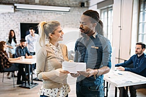 Portrait of architects having discussion in office