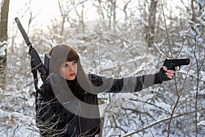 Portrait of armed young lady