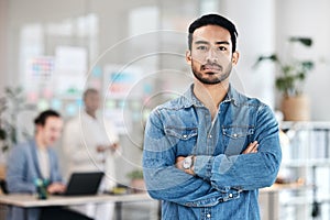 Portrait, arms crossed and man in office with leadership, opportunity and startup business. Serious project manager