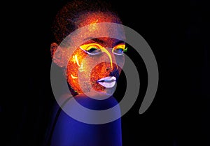 Portrait, art and creative with neon woman on black background for makeup, glitter or colorful glow. Face, fantasy and