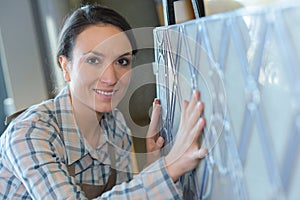 Portrait artist with lead glass creation