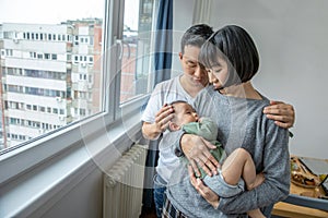 Portrait of asain family in living room