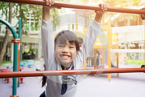 Portrait asia children feeling happy children's playground at outdoor public park for