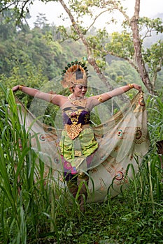 Portrait of Asia dancer at outdoor in rainforest