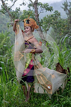 Portrait of Asia dancer at outdoor in rainforest