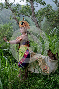 Portrait of Asia dancer at outdoor in rainforest